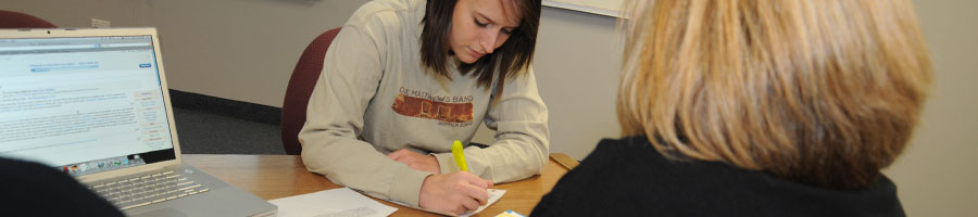 Education students take notes during class.