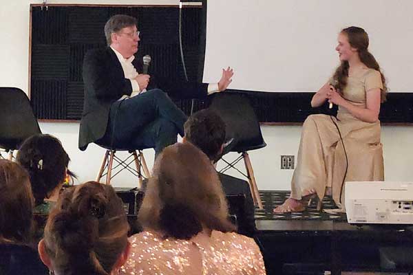 Student being interviewed about her project