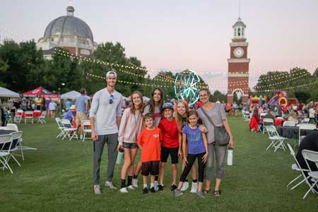 The Frost family stops for a photo during Union Night - one of our favorite Union traditions! This event occurs during Family Weekend, and we love photos of families enjoying the activities on the Great Lawn. That's what this weekend is all about!