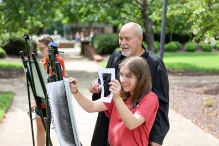 Each year, we aim to capture these moments between faculty and students. Our people-focused professors are essential to Union's education model, and we love this photo of Chris Nadaskay leading a drawing exercise outside.