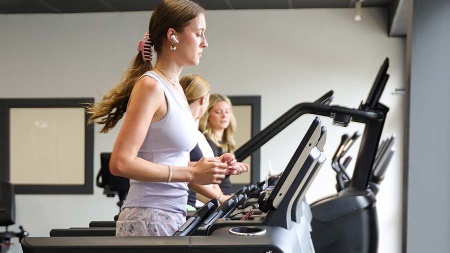 Woman working out in the Wellness Center