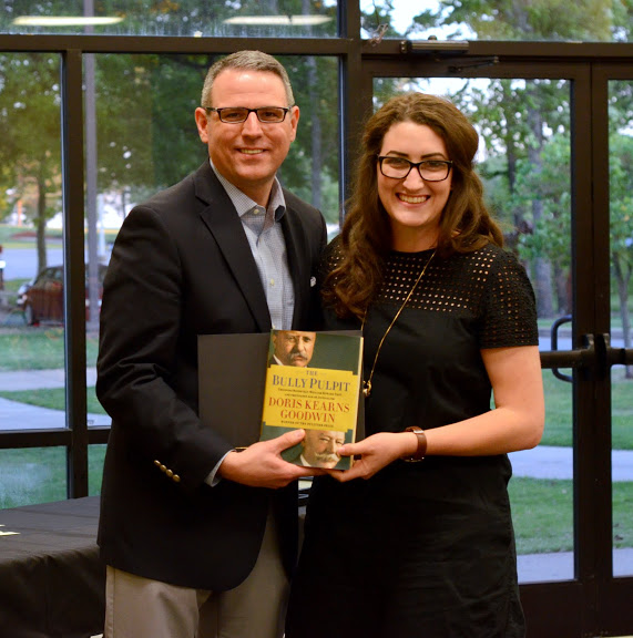 Dr. Keith Bates presents a certificate of commendation and a book to Olivia Winters at the history awards banquet on May 5, 2016, for the excellent paper that she presented at the Tennessee Phi Alpha Theta Regional Conference on April 2. Photo by MiKalla Cotton