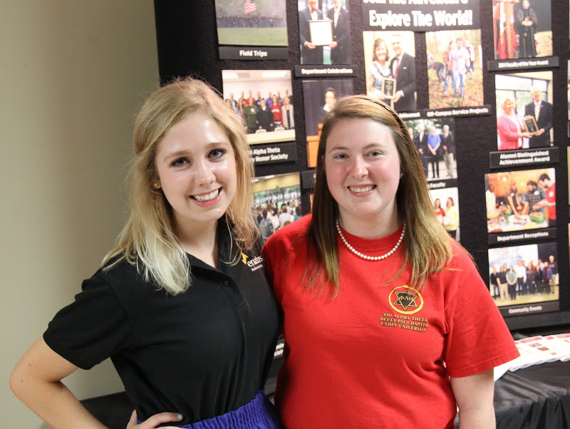 Rutledge Honorary History Club President Kathryn Mitchell (right) stands with classmate Hannah Willis at the Student Organizations Fair on August 17, 2015.