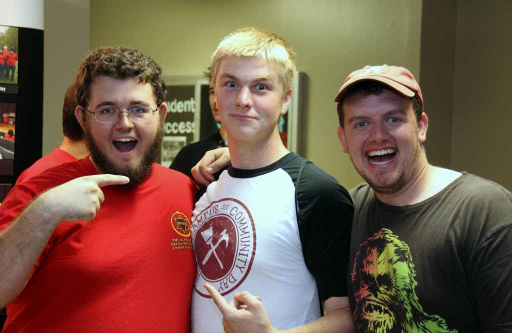 Union students enjoy a light moment together at the history department display booth during the Student Organizations Fair on August 17, 2015. They are (left to right) Phi Alpha Theta President Nicholas Hancock, Nathan Van Neste, and Noah Miller.