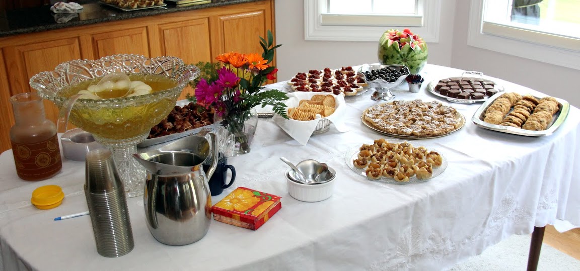 An elaborately prepared food table awaits guests at the History Welcome Reception at Dr. Stephen Carls's home on August 31, 2015.