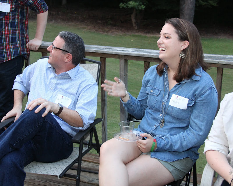 Dr. Keith Bates and history major Emily Littleton enjoy a light moment at the History Welcome Reception on August 31, 2015.