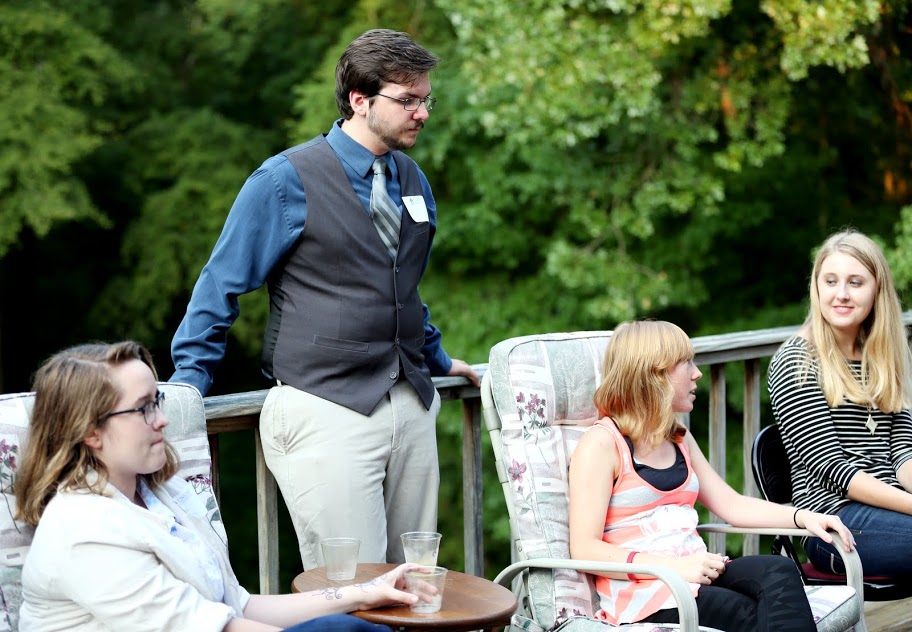 Attendees enjoy the nice weather and fellowship at the History Welcome Reception on August 31, 2015. They are (left to right) Laura Beth Russell, Ben Pinkley, Chelsey Sauls, and Amanda Couch. Photo by Kristi Woody