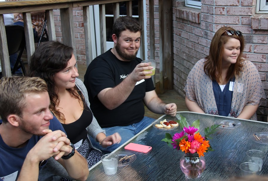 Nicholas Hancock (second from right) smiles for the camera at the History Welcome Reception on August 31, 2015. Others in the photo are (left to right) Seth Reid, Abbey Peecher, and Brianna Hammond.