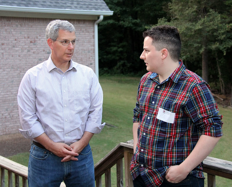 Dr. David Thomas (left) and history major Nic Linn talk together at the History Welcome Reception on August 31, 2015.