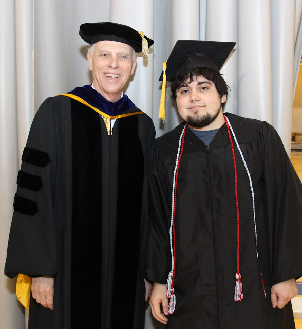 History major Ashton Hostetler (right) stands with Dr. Stephen Carls prior to Union's fall graduation exercises at West Jackson Baptist Church on December 12, 2015.