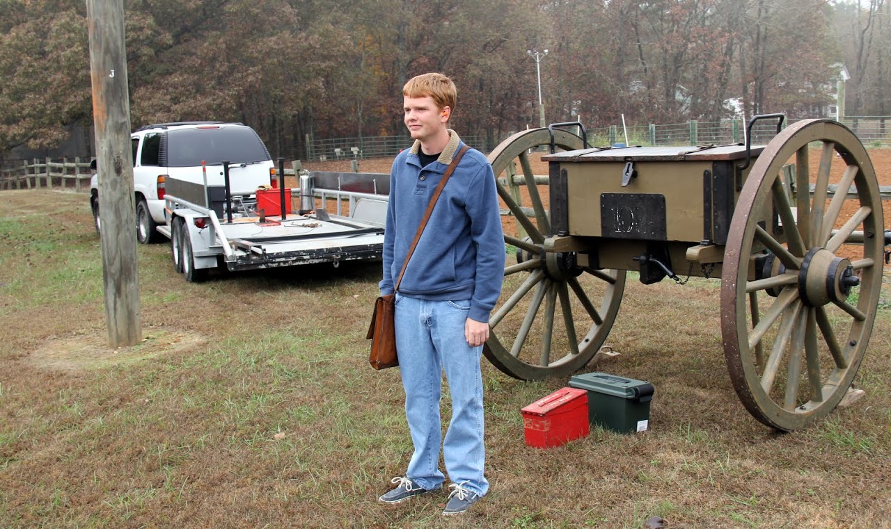 Gideon Ragland awaits the command to deliver a packet of gunpowder located in his leather pouch for use in the firing of a cannon at Britton Lane Battlefield on November 3, 2015.