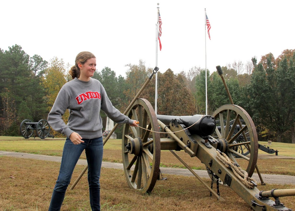 Beth Adams gets ready to pull the lanyard (trigger cord) during a cannon firing at Britton Lane Battlefield on November 3, 2015.