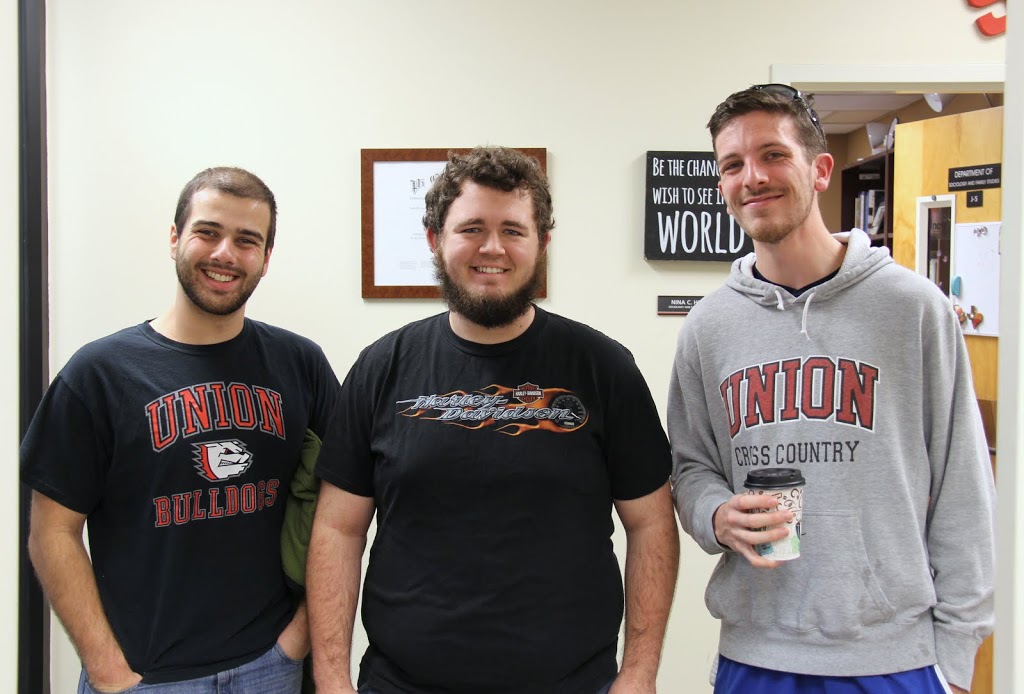 Phi Alpha Theta members (left to right) Allen Bradley, Nicholas Hancock, and Logan Smith wait for the history department's group to leave campus for Britton Lane Civil War Battlefield to do a community service project as a part of Union University's Day of Remembrance on November 3, 2015.