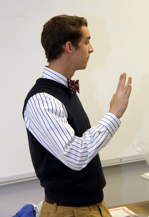 Jonathan Greer takes the membership oath of the Rutledge Honorary History Club at the club's fall initiation meeting on October 19, 2015.