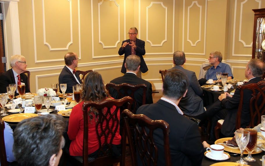 Dr. Robert Citino answers a history question at a dinner in his honor on October 29, 2015.