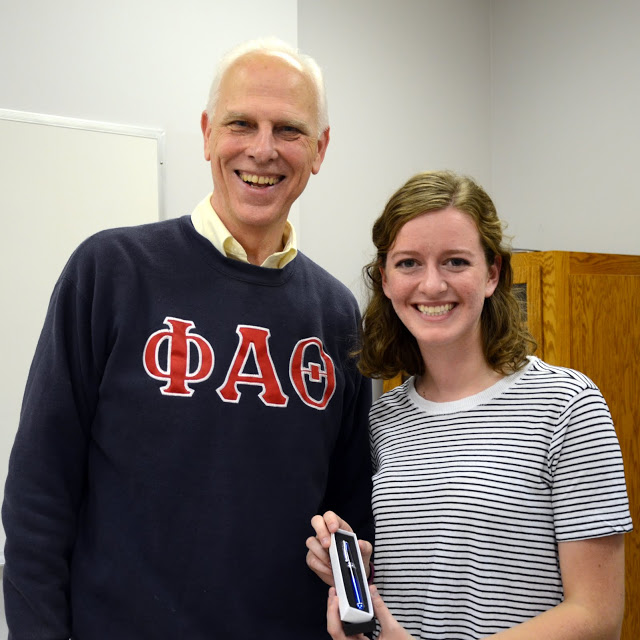 Dr. Stephen Carls stands with Beth Adams after giving her a Phi Alpha Theta pen on September 14, 2015, for being the 450th person inducted into Union's Delta-Psi chapter. Photo by Elizabeth Wilson