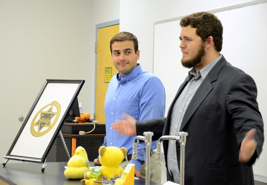 Delta-Psi Chapter President Nicholas Hancock (right) welcomes attendees to the Phi Alpha Theta initiation/plenary meeting on September 14, 2015. Vice President Allen Bradley (left) listens. Photo by Elizabeth Wilson