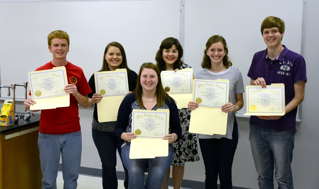 New Phi Alpha Theta members show off their certificates of membership following their induction ceremony into the national history honor society at the Delta-Psi chapter's fall meeting on September 14, 2015. They are (left to right) Gideon Ragland, Jordan Sellers, Kathryn Mitchell (seated) Priscilla Porter, Beth Adams, and Thomas Gray. Photo by Elizabeth Wilson