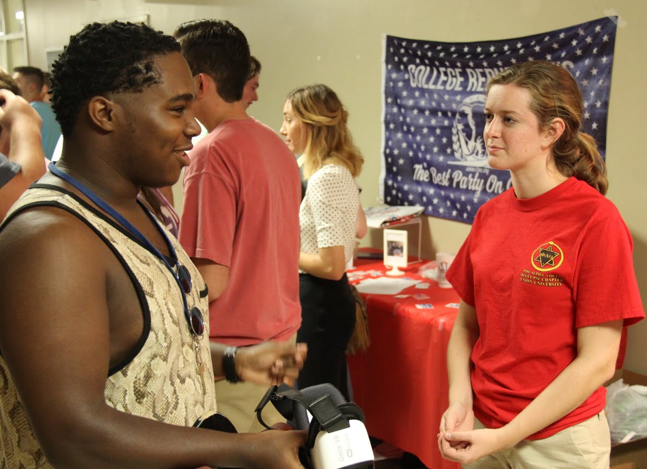Beth Adams (right) talks to Union student Trey Hall at the Student Organizations Fair on August 22, 2016.