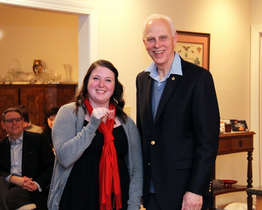 Kathryn Mitchell shows off the Tennessee Great War Commission pin she has just received from Dr. Stephen Carls on December 10, 2016, for her work at a Great War Symposium event at Jackson's First Presbyterian Church in early November.