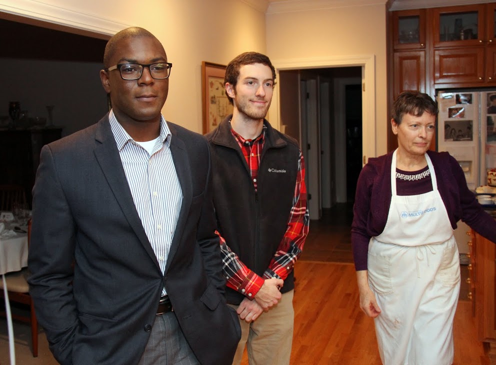 Byron Elam (left to right), Luke Adkins, and Dr. Alice-Catherine Carls watch theater major Priscilla Porter perform an excerpt from Shakespeare's Twelfth Night at the Phi Alpha Theta Christmas dinner on December 10, 2016.