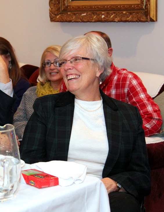 Nancy Thomas smiles after receiving a package of Christmas Peeps at the Phi Alpha Theta dinner on December 10, 2016.