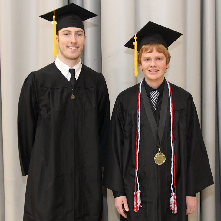 Phi Alpha Theta members Luke Adkins and Gideon Ragland stand together prior to Union University's fall commencement services on December 17, 2016.
