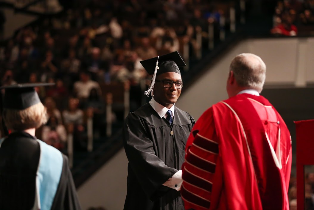 History major Byron Elam accepts his bachelor of arts degree from Dr. Samuel W. Dub Oliver at Union's fall graduation on December 17, 2016. Photo by Kristi Woody