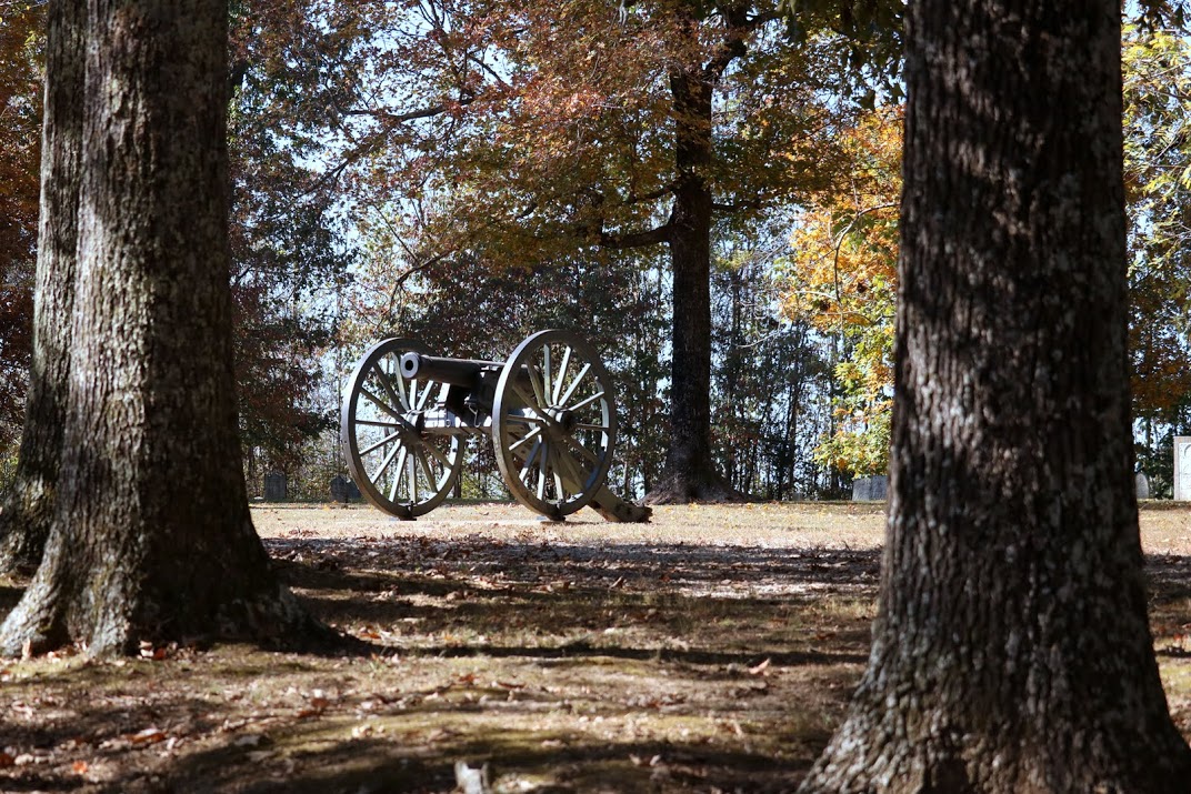 A Civil War cannon sits among the trees at Salem Cemetery on November 1, 2016. Photo by Elizabeth Wilson