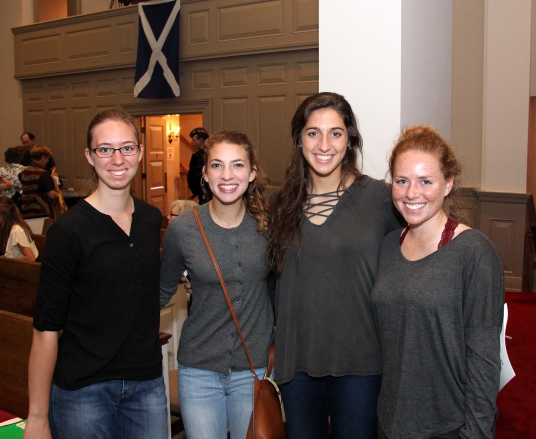 Union students Emma Otto (left to right) Olivia Schmitke, Brooke Watson, and Jordan Alexander stand in the sanctuary of First Presbyterian Church in Jackson following a World War I commemoration program that the Tennessee Great War Commission sponsored on November 4,, 2016. A Scottish flag hangs from the balcony behind them.