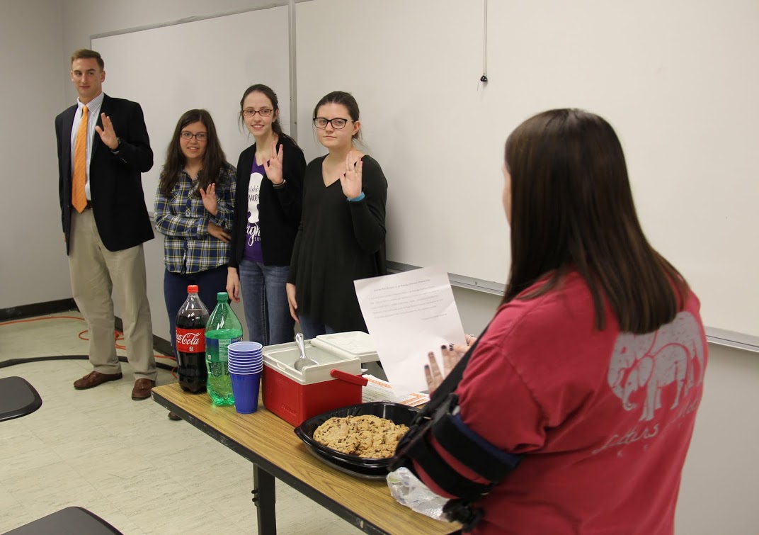 Rutledge Honorary History Club President Kathryn Mitchell (front right) conducts the induction oath for incoming members on October 10, 2016. The new initiates are (left to right) Jeff Williams, Jessa Potts, Lauren Butler, and Emily Summers.