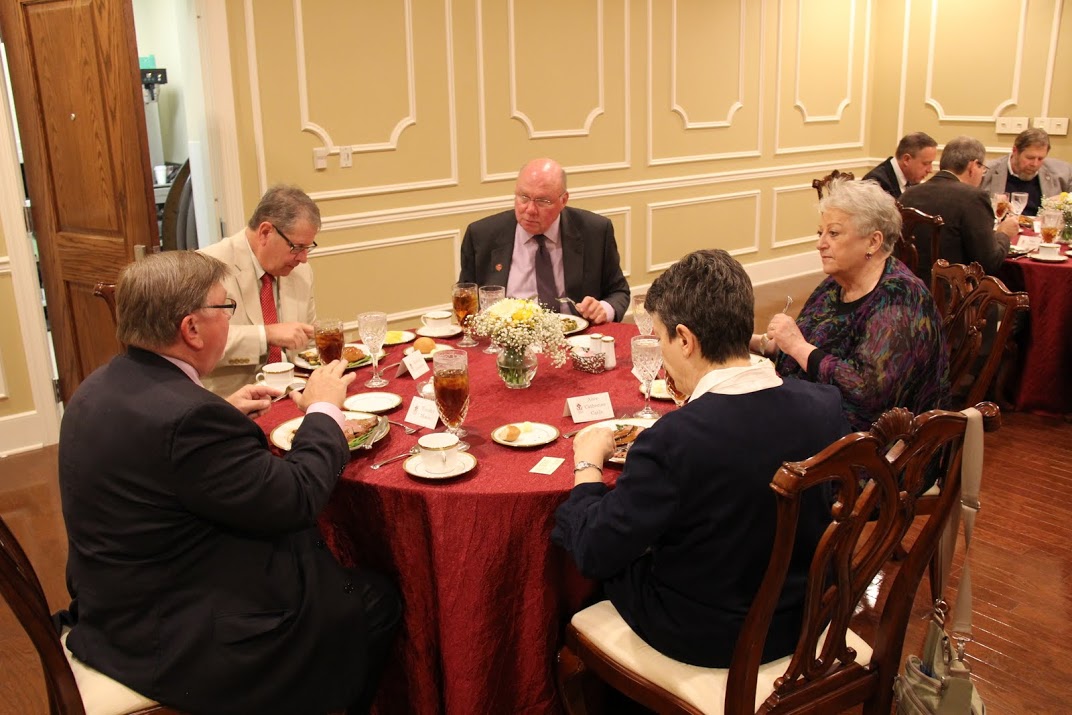 Attendees at a dinner in honor of Dr. Sean McMeekin enjoy good food and fellowship. They are (starting on the left, going clockwise) Judge Tommy Moore, Richard Gonzales, Andy Pouncey, Dr.. Joanne Stephenson, and Dr. Alice-Catherine Carls.