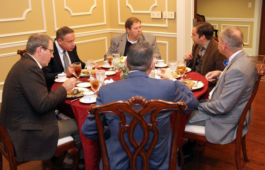 Dr. Sean McMeekin (second from right), the 2016 Carls-Schwerdfeger History Lecturer, enjoys conversation with Union University administrators and history department faculty members during a dinner in his honor on October 3, 2016. Others in the photo are (starting on the left, going clockwise) Dr. John Netland, Dr. Henry Allen, Dr. Ben Mitchell, Dr. Samuel W. Dub Oliver, and Dr. Keith Bates (back to camera).