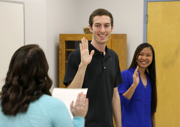 Delta-Psi Vice President Kathryn Mitchell (left) leads the chapter's new inductees in the Phi Alpha Theta membership oath during its fall meeting on September 13, 2016. The new members are Luke Adkins and Katherine Cheshire. Photo by Elizabeth Wilson