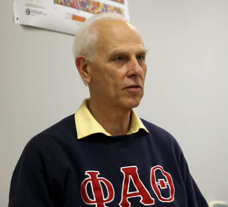 Dr. Stephen Carls reads a congratulatory letter to Union's new Phi Alpha Theta members from the society's national office during the Delta-Psi chapter's fall initiation on September 13, 2016. Photo by Elizabeth Wilson