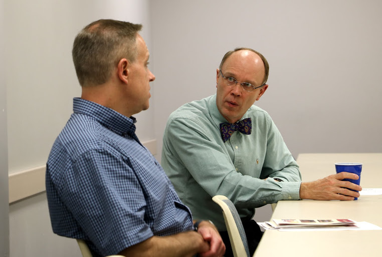 Dr. Henry Allen (left) and Robert Briley talk together during a break in the Delta-Psi chapter's business meeting on September 13, 2016. Photo by Elizabeth Wilson