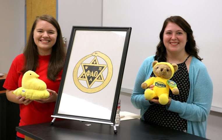 Delta-Psi Chapter President Jordan Sellers (left) and Vice-President Kathryn Mitchell show off Peeps stuffed animals at the end of the chapter's fall plenary meeting on September 13, 2016. Photo by Elizabeth Wilson