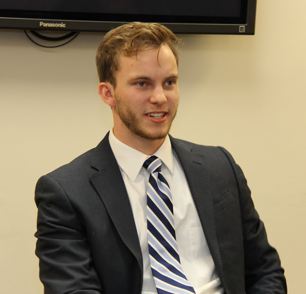 Seth Reid talks about Christian hope in the life of C. S. Lewis during his honors thesis defense on December 8, 2017.