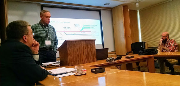Dr. Henry Allen (standing) delivers a paper on November 3, 2017, about The Arts and Traditional Lutheranism: A Protestant Outlier Tradition at Dordt College in Iowa for conference titled Culture, Criticism, and the Christian Mind.