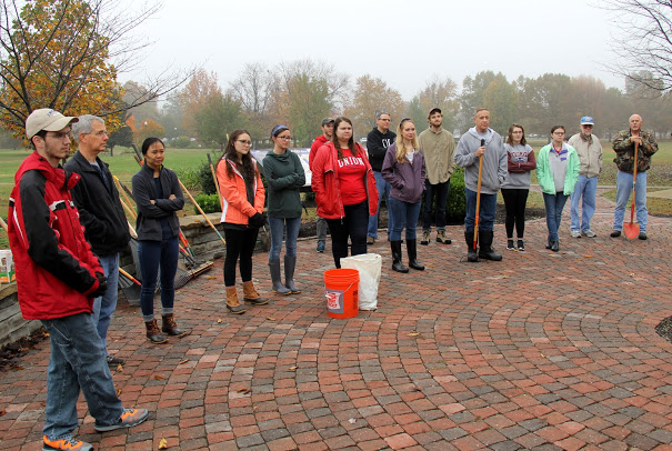 Union University participants in the History Department/Phi Alpha Theta community service project at Liberty Garden Park listen to project coordinator Tammy Buchanan-Anderson talk about the history of the park on the morning of November 7, 2017. They are (left to right): Matthew Latham, Dr. David Thomas, Katherine Cheshire, Katie Allison, Lillie Salazar, Seth Reid (behind), Jessica Barton, Dr. Keith Bates, Ali Renckens, Luke Sower, Dr. Henry Allen, SaraBeth Conley, Emily Summers, Dr. Terry Lindley, and Dr. Kelvin Moore.