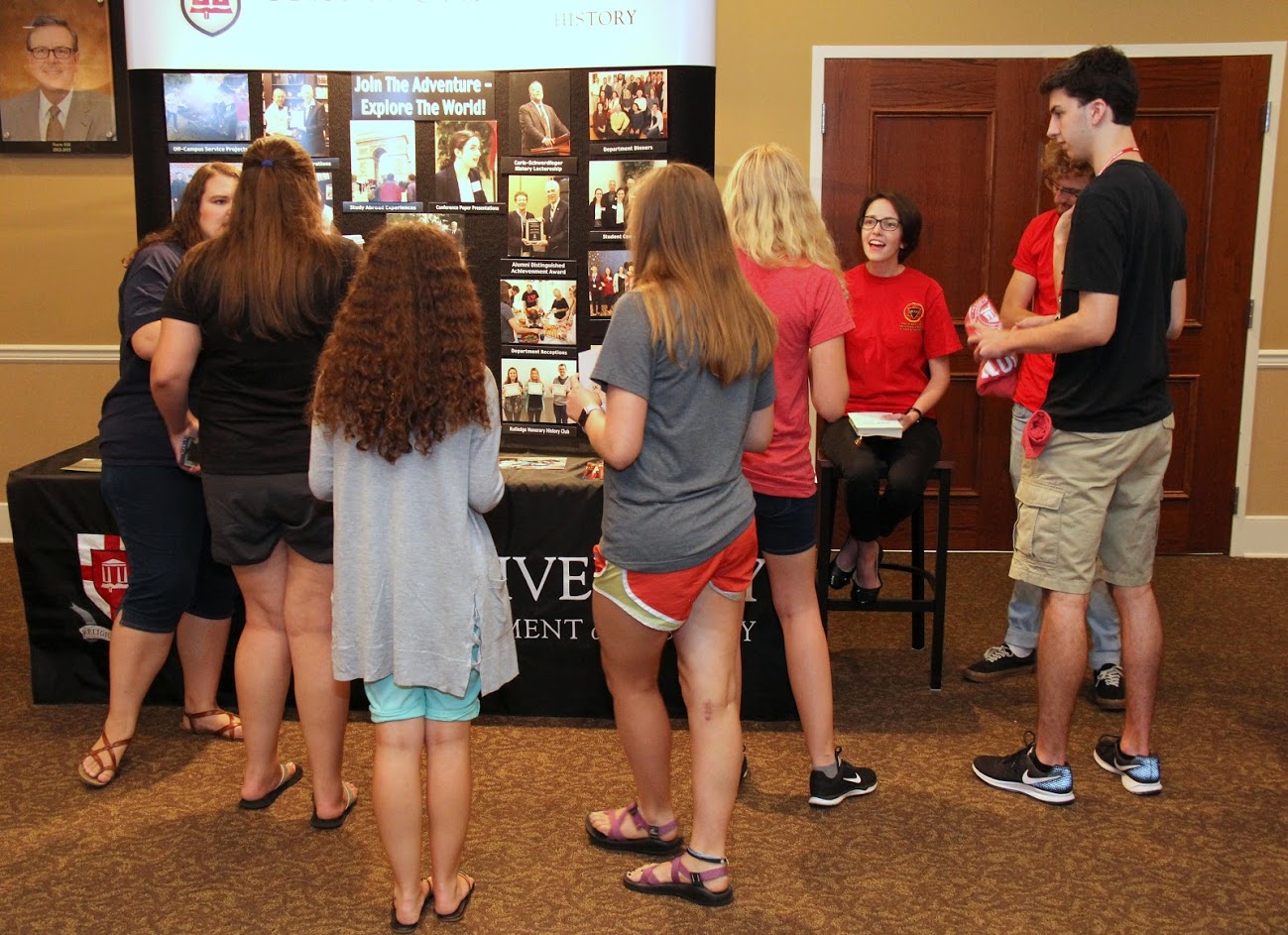 History department student representatives converse with students at the Campus Life Fair on August 19, 2018. They are: Rutledge History Club President Jessica Barton (left); Phi Alpha Theta President Lauren Butler (third from right); and Phi Alpha Theta Vice President Luke Sower (second from right).