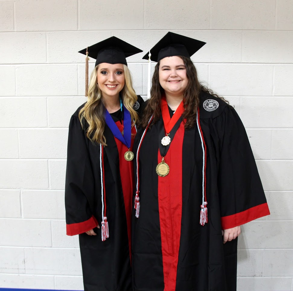 Graduating Phi Alpha Theta members Nakota Wood (left) and Jessica Barton stand together prior to Union University's undergraduate commencement service on December 15, 2018.