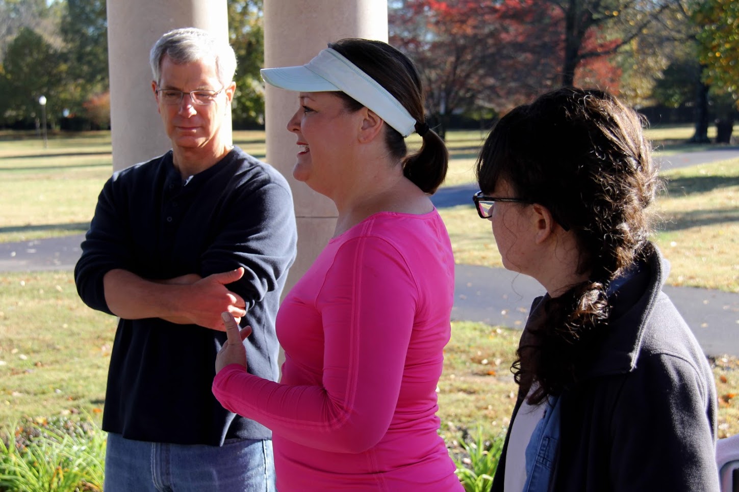 Project supervisor Tammy Buchanan-Anderson (center) talks about the gazebo at Liberty Garden Park during introductory remarks on November 6, 2018. Dr. David Thomas (left) and Lillie Salazar listen.