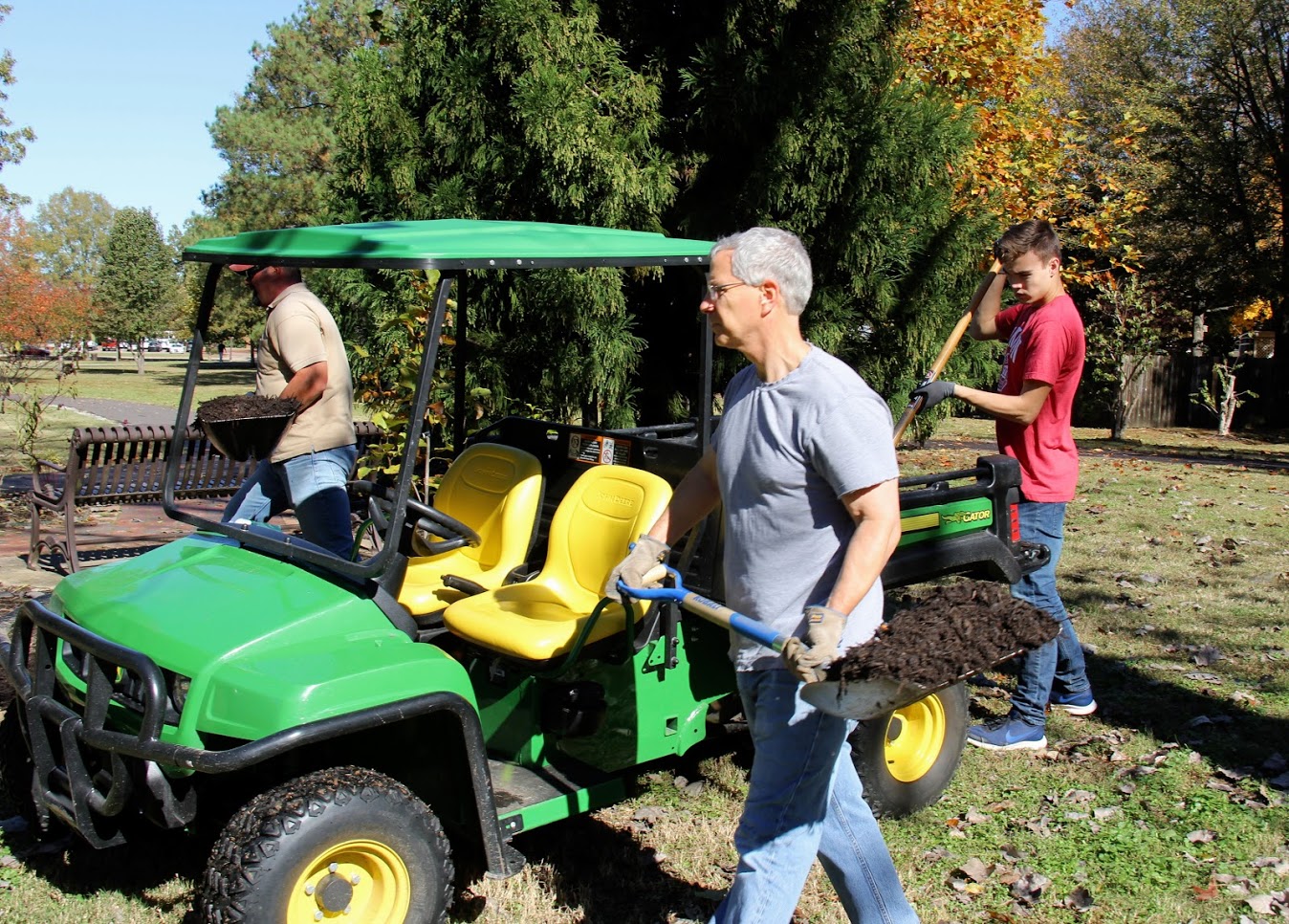 Community service project participants spread mulch at Liberty Garden Park on November 6, 2018. They are (left to right) J. D. Sims of the City of Jackson, Dr. David Thomas, and Jack Waters.