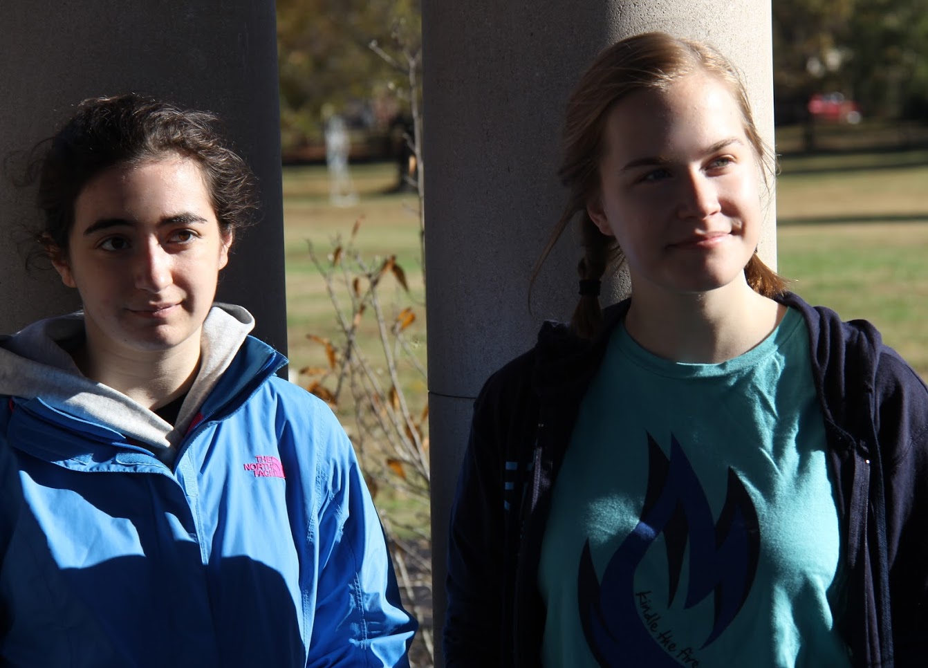 Phi Alpha Theta members Leah Atkins (left) and Megan Ledbetter listen to Tammy Buchanan-Anderson of the City of Jackson talk about the history of Liberty Garden Park and Arboretum at the beginning of the history department's community service project there on November 6, 2018.