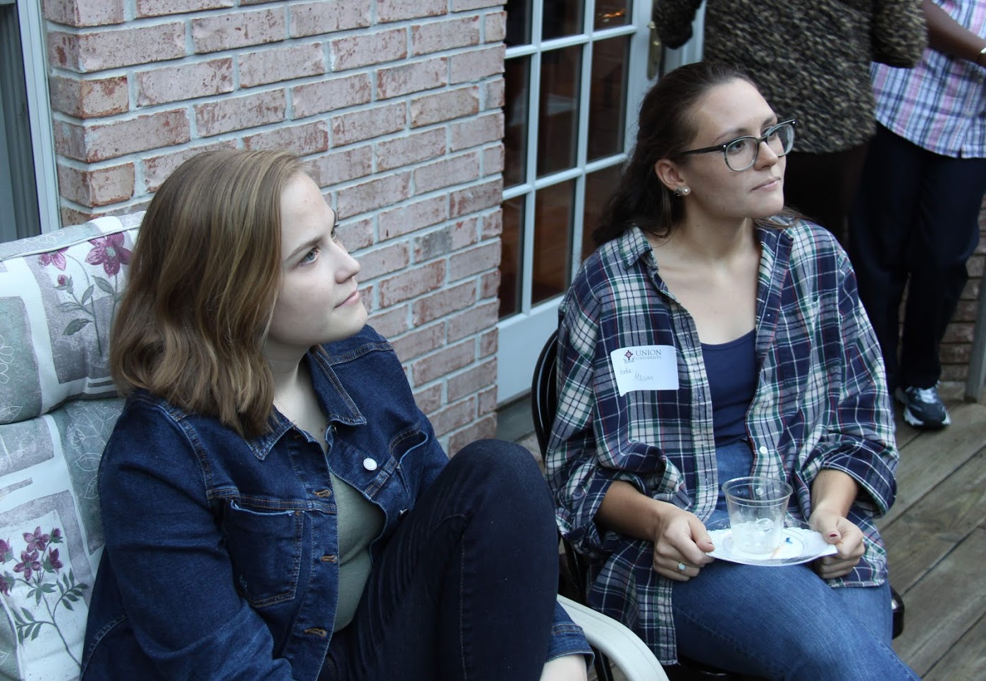 Megan Ledbetter (left) and Katie Allison relax at the History Welcome Reception on September 10, 2018.