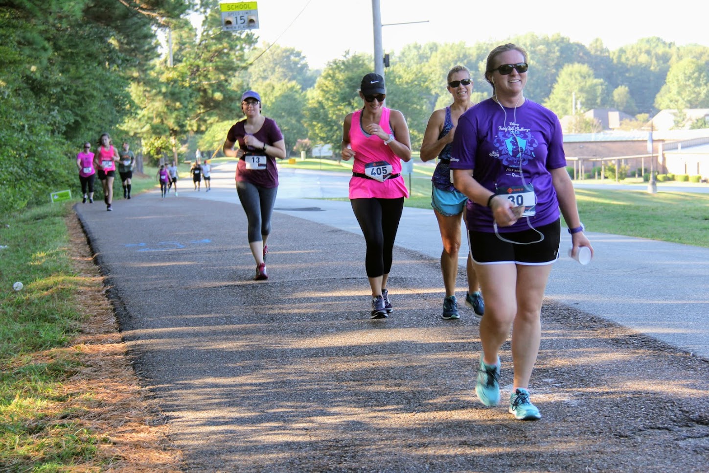 Competitors in the Racing So They Can Ride event on September 15, 2018, approach the three-quarters mark in the 5k race.