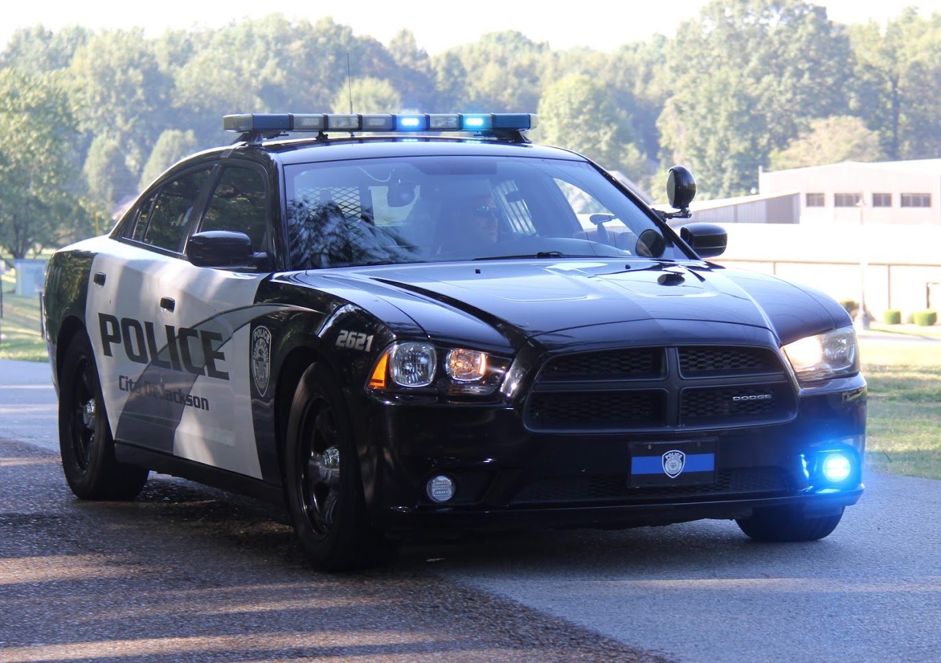 A City of Jackson police vehicle provides protection for runners during the Racing So They Can Ride 5k and 10k races on September 15, 2018.