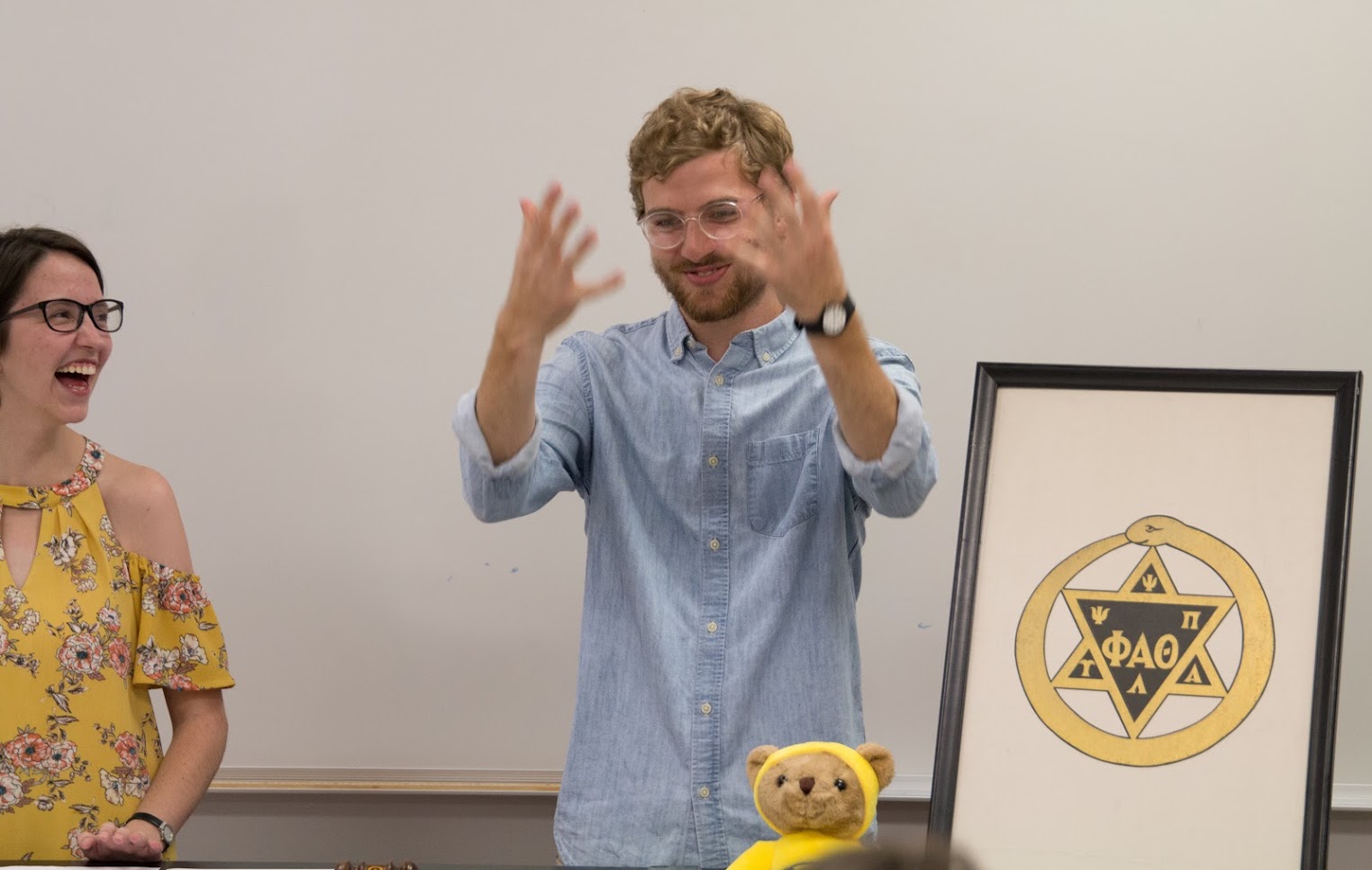 Delta-Psi President Lauren Butler laughs when Vice President Luke Sower raises his hands during a light moment in the Phi Alpha Theta meeting on September 20, 2018. Photo by Lynn Tucker