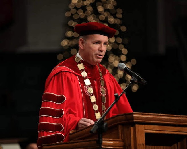 Union University President Dr. Samuel W. Dub Oliver welcomes attendees to the morning commencement service at West Jackson Baptist Church on December 14, 2019. Photo by Kristi Woody